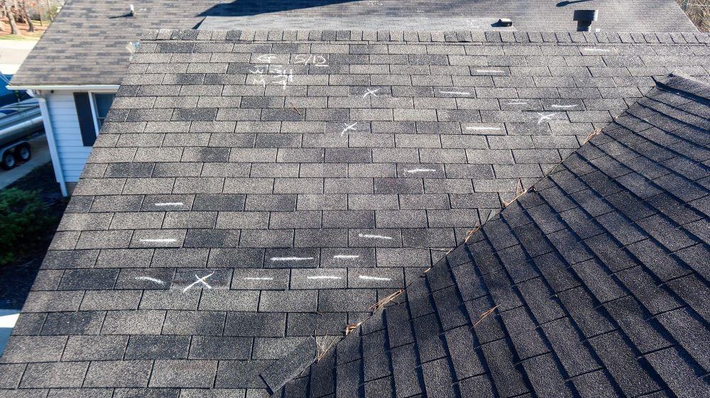 Chalk-marked hail test square on a shingle roof in Fair Oaks Ranch