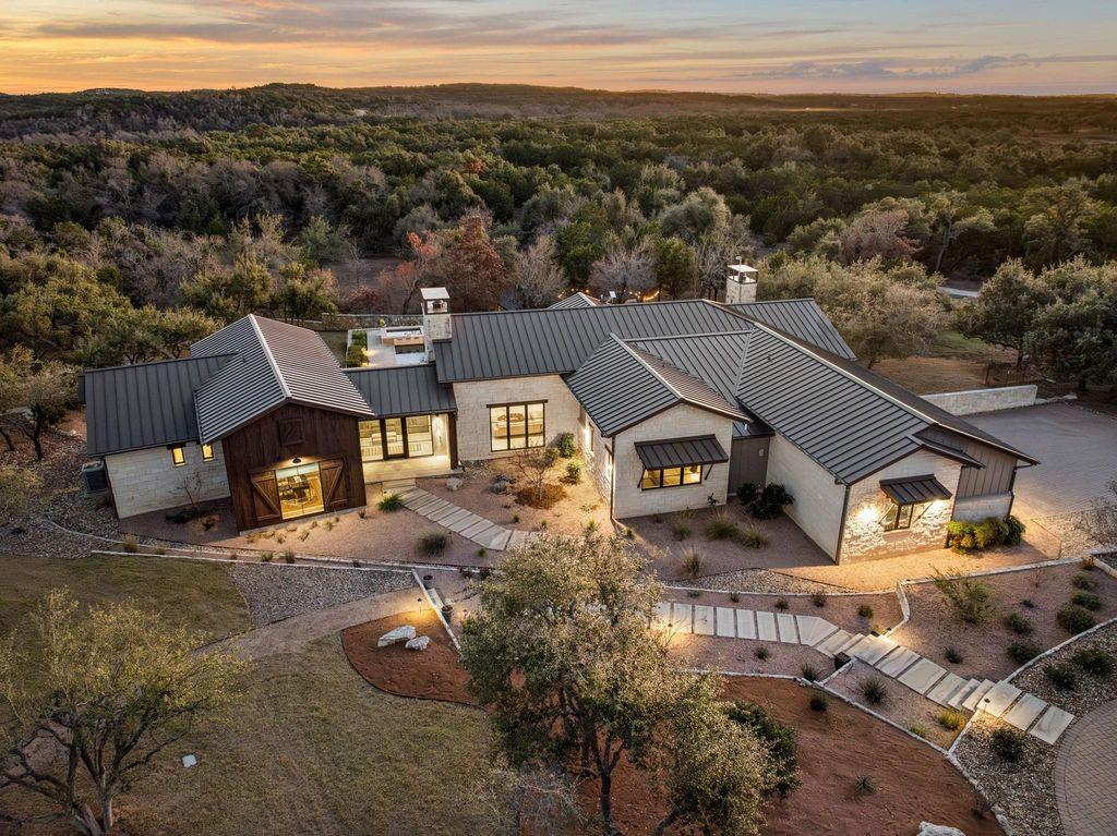 Completed standing seam metal roof replacement on a Fair Oaks Ranch estate home