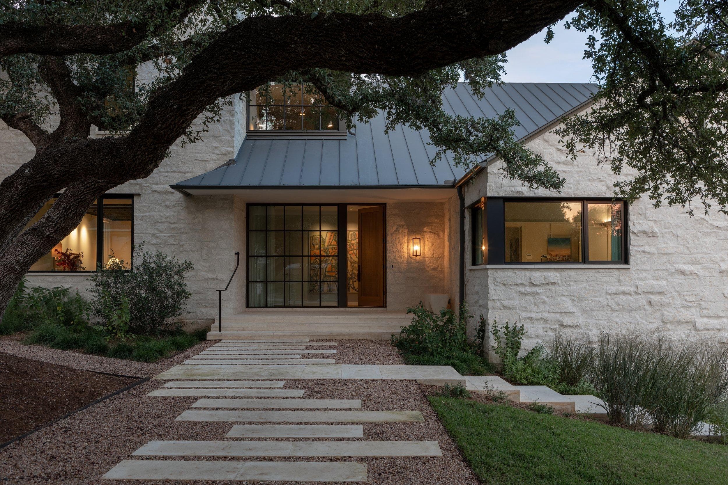 Standing seam metal roof on a limestone home in Fair Oaks Ranch, Texas