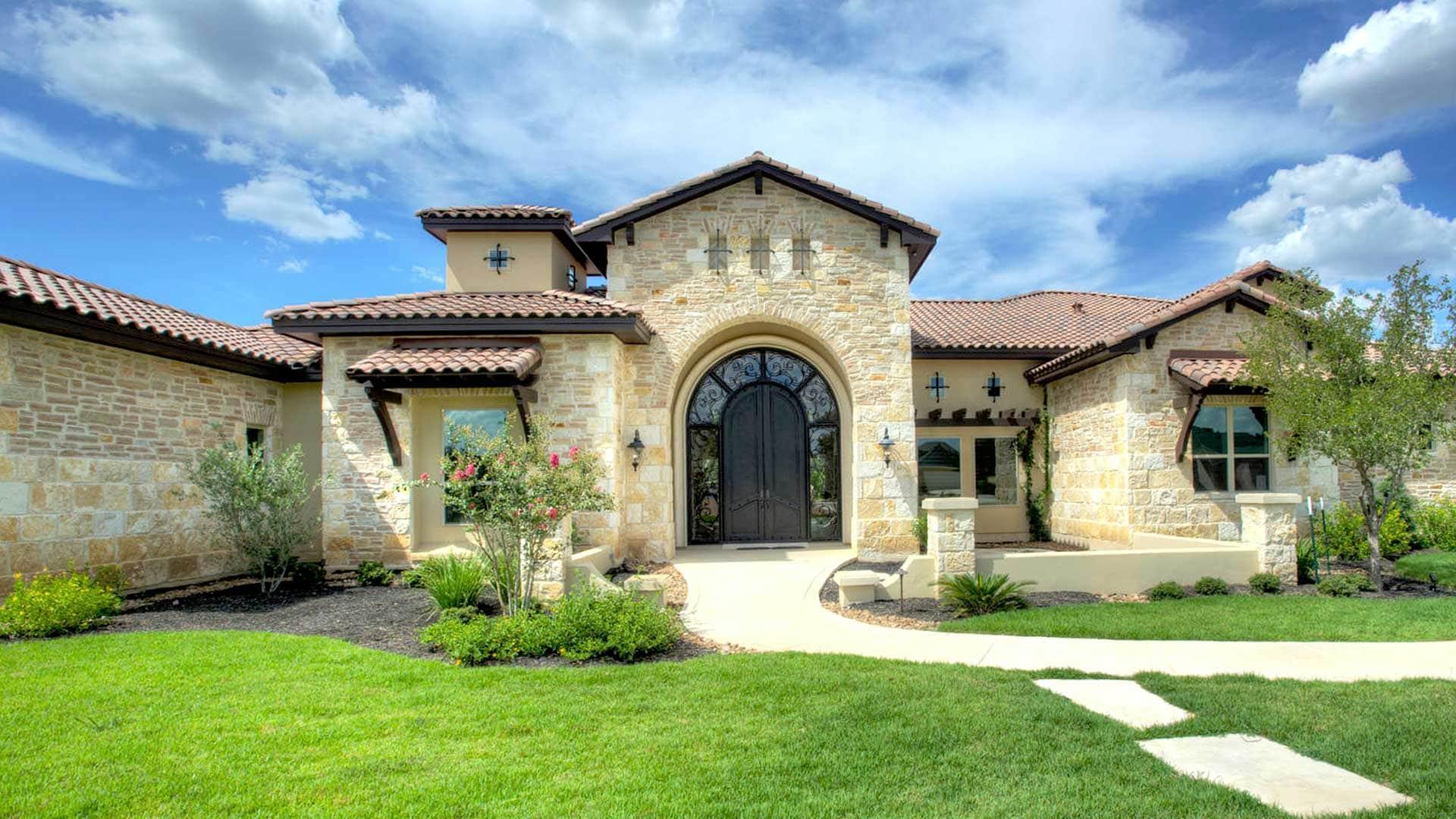 Terracotta clay tile roof on a Spanish-style home in Fair Oaks Ranch