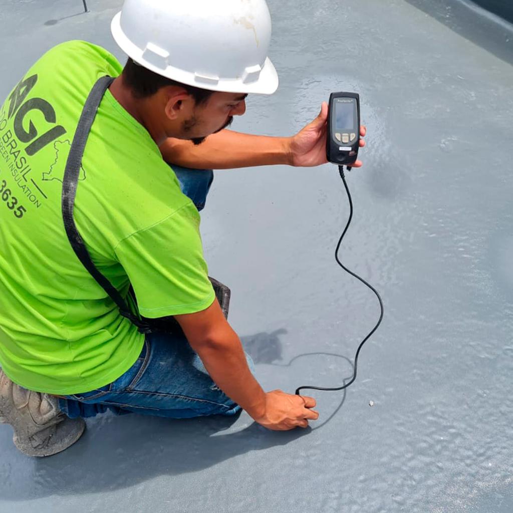 Moisture testing on a flat roof before a silicone coating application