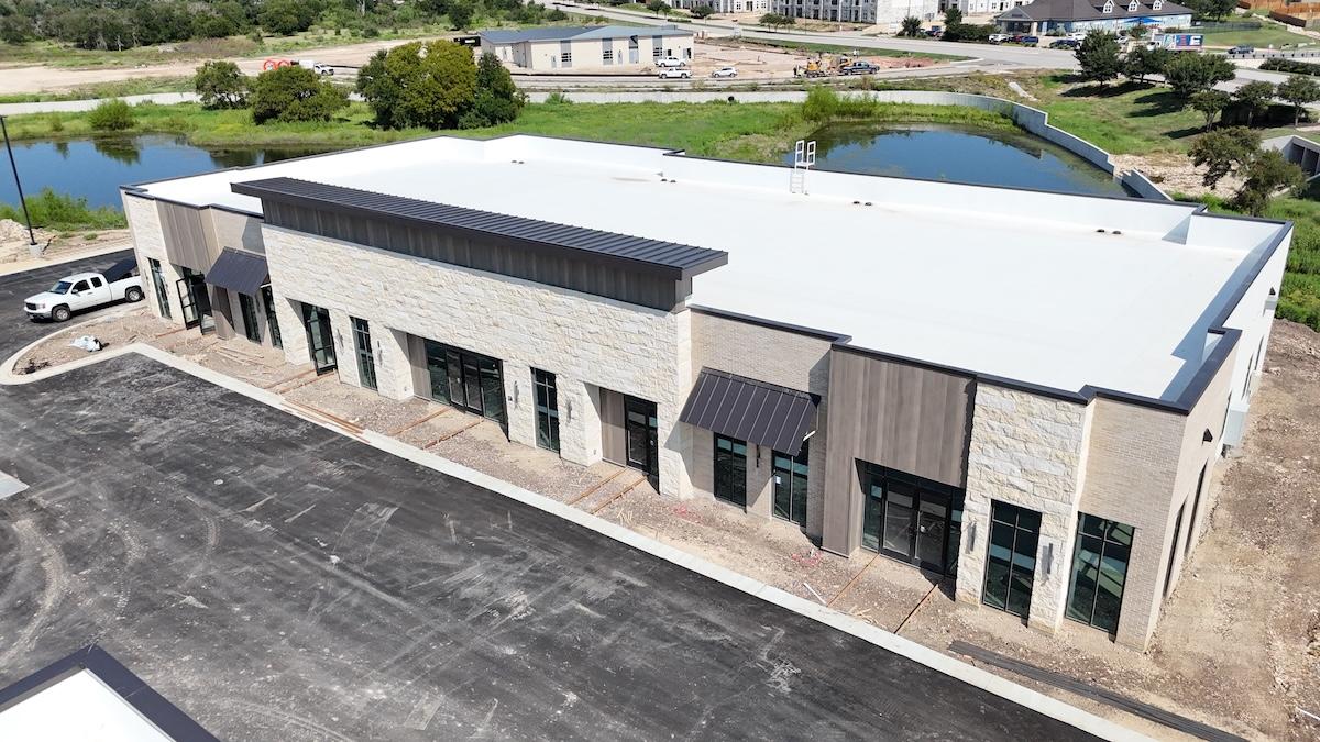TPO membrane on a retail building along I-10, Boerne